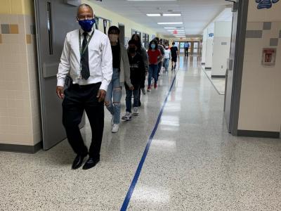 Photo of Mr. Hicklin giving his students a tour of the building on the first day of school!