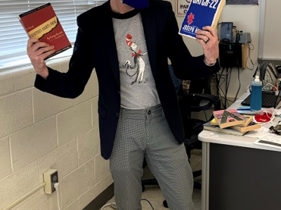 Photo of Mr. Goldberg Paying homage to Dr. Seuss on his birthday.